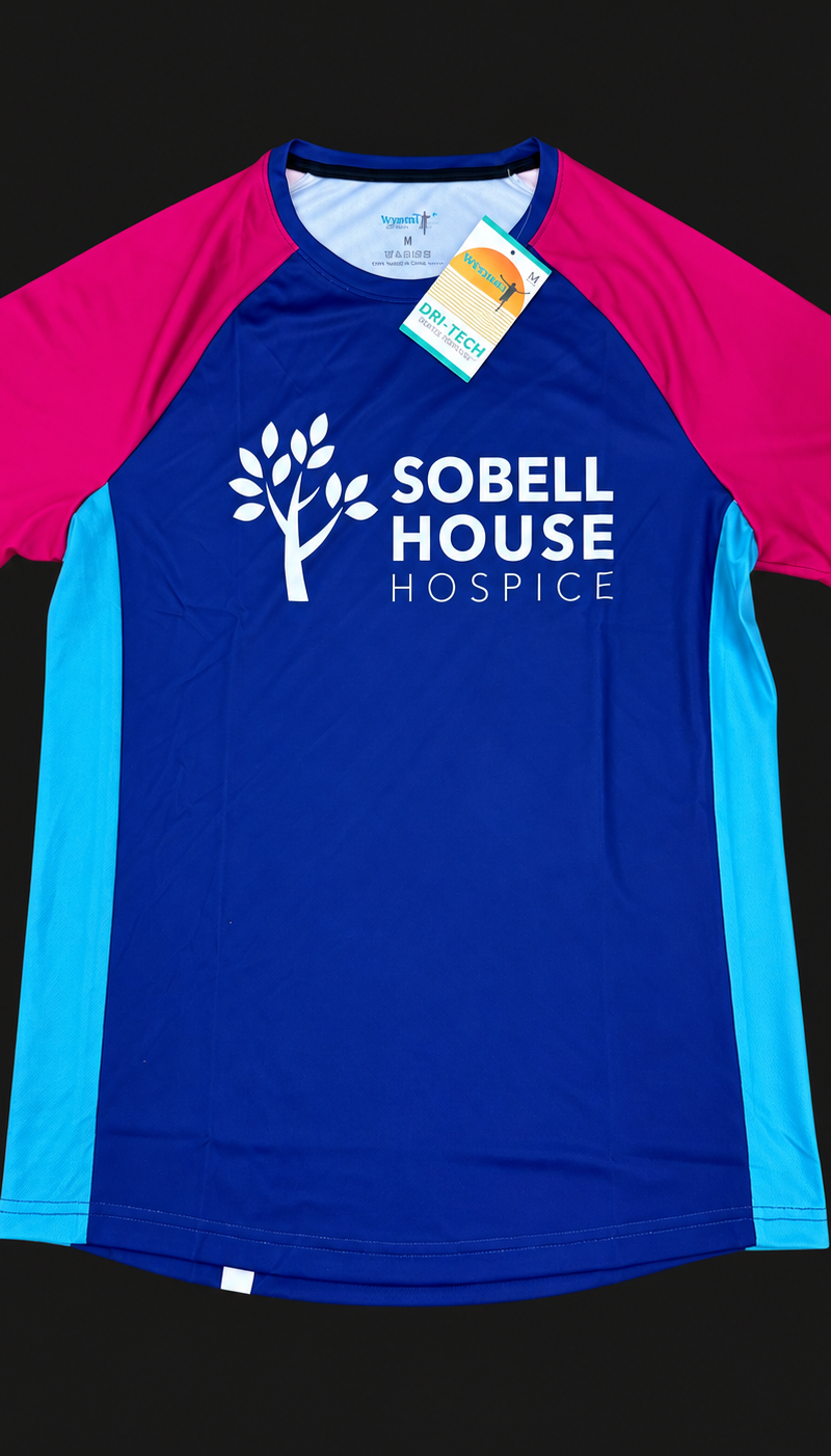Technical running vests made from recycled fabric on a rail